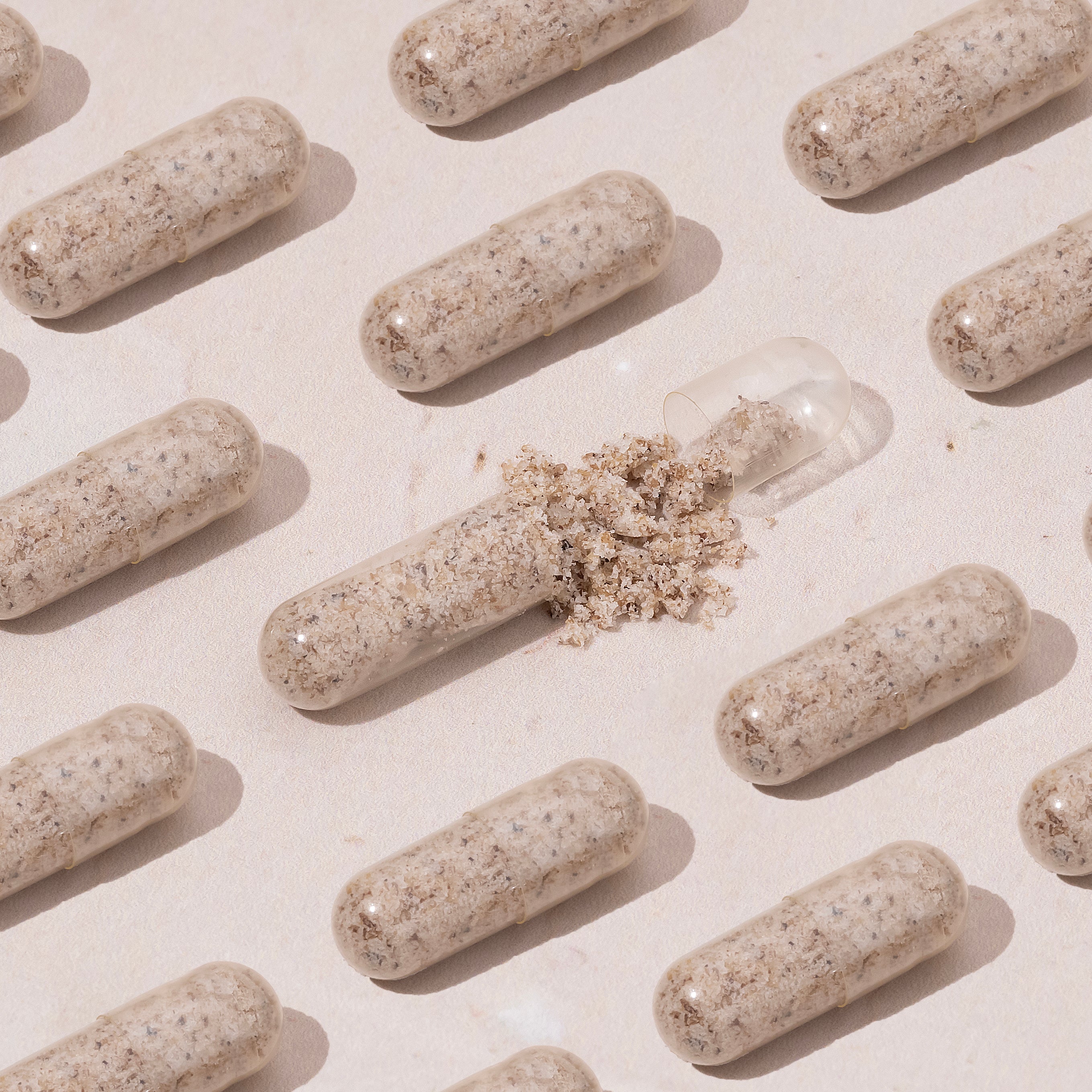 Supplement bottle labeled 'Thyroid,' with benefits listed: energy, metabolism, mood, brain, stress, cholesterol, sleep.